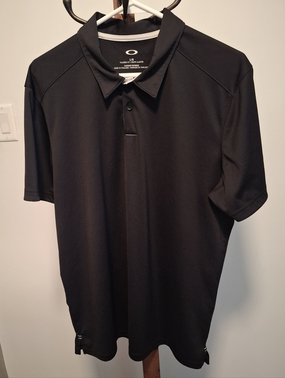 Oakley Men's Black Performance Polo W/ White Trimmed Collar.  NWOT. Mens Large.